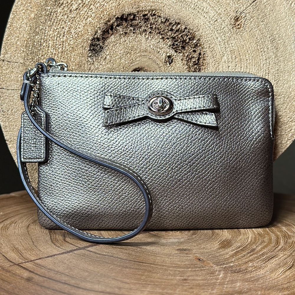 COACH Metallic Gunmetal Silver Leather Turnlock Bow Wristlet